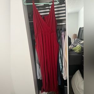 Size 18 red rumpsuit. Ties on the bottoms of the legs